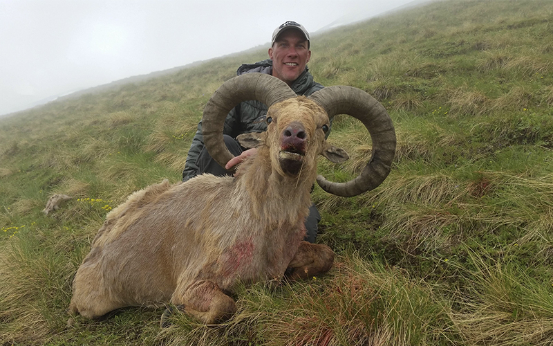 Mike Monnin and his giant Dagestan Tur